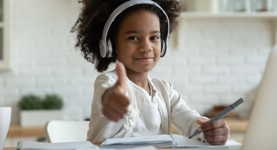 Young Girl with thumbs up