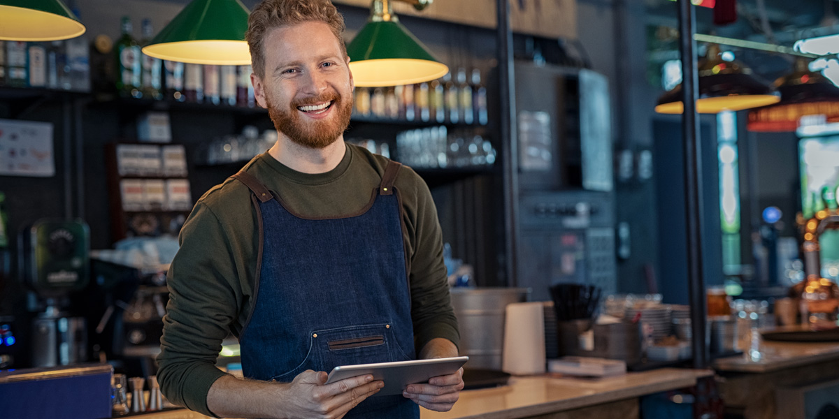 business owner on tablet